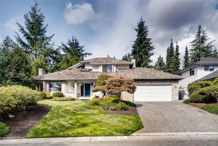 Beautiful NW contemporary styling in sought after Mill Creek Country Club