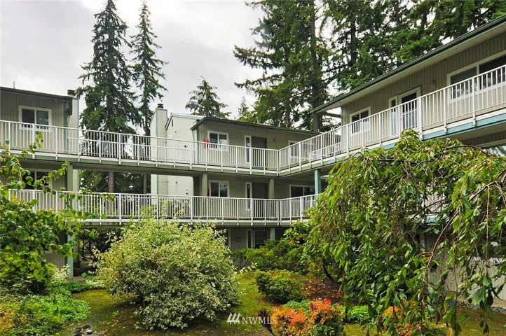 Welcome to Forest Lynn Condominiums! Unit 5808 B is at the center of this shot, on the second level. Building has elevator for completely level access. A three minute drive from I-5 on ramp, but so quiet and private.