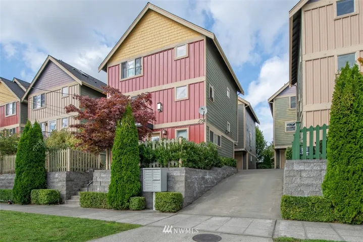Stand alone townhome w/ freshly painted exterior located in back left of drive. Garage is easy load in-out and entry is through gated private backyard