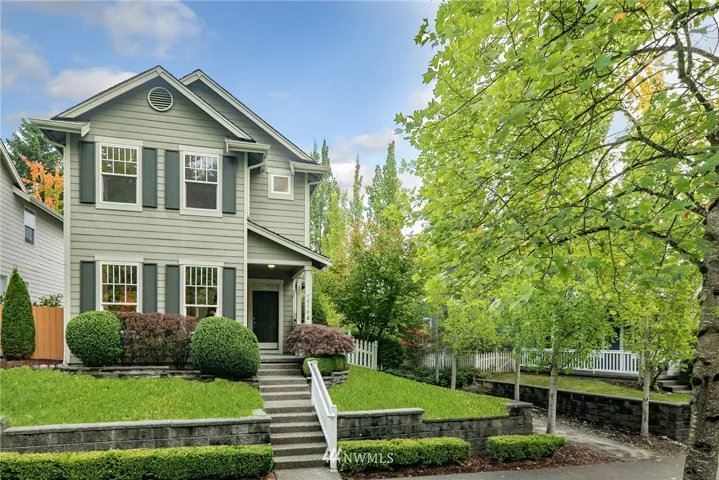 Welcome Home to Snoqualmie Ridge.  Just blocks from all the downtown Ridge shops, restaurants and more!  Notice the neighborhood walk path (on the right) giving this home a little more room from immediate neighbors.