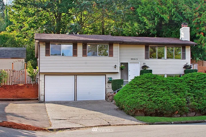 Home was built on a quiet cul-de-sac and has RV Parking or 3rd long driveway.  New garage doors installed 2017.