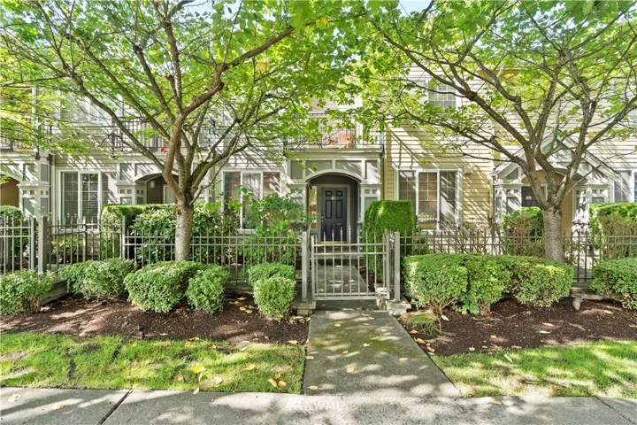 A quaint entrance for #L605. Enter through the gate and step onto your front patio before entering into this comfortable unit.