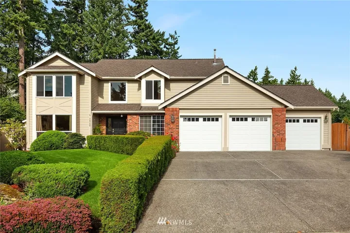 Welcome to Campus Highlands!  New Architectural Comp Roof!  Gorgeous cedar siding with brick accents.