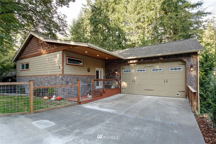 Nice big, level driveway for several cars to park in.