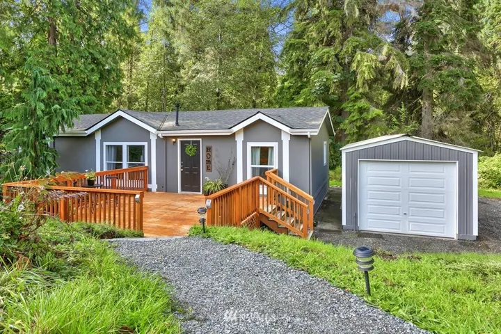 New roof, deck, garage door, and exterior paint! One year home warranty is included!