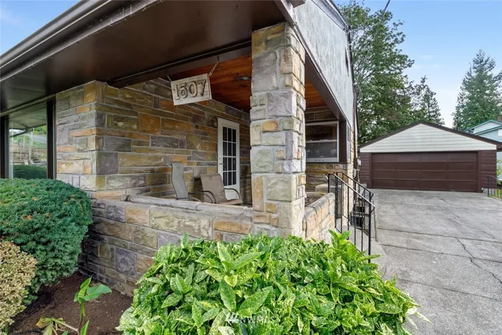 Solid Perma Stone as exterior and beautiful covered porch.