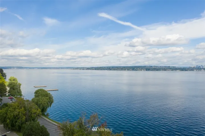 Opportunity awaits! Stunning view of Lake Washington, The Cascades, Mount Rainier and the Bellevue skyline!