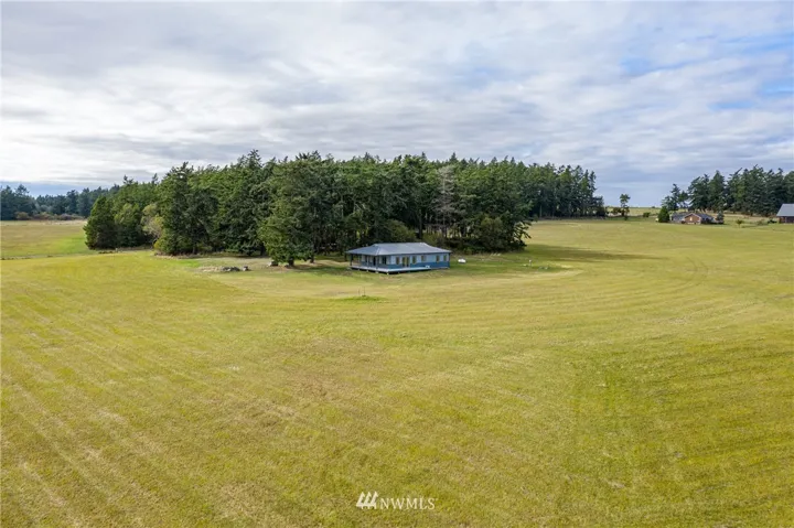 Territorial pastorial views from this sunny 30 acres with 2 bedroom, 2 bath home.
