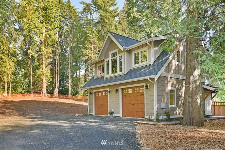 Fantastic location near town and ferry, .30 acres, cleared and ready to build. City water and sewer! Live in your quality carriage house while you build. Learn more at www.Beautiful-Byron.com