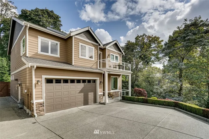 Lower Kennydale 4 bedroom, 3.5 bathroom custom built home designed to capture unique setting and green belt views.  Immaculate, turn key home that won't disappoint!