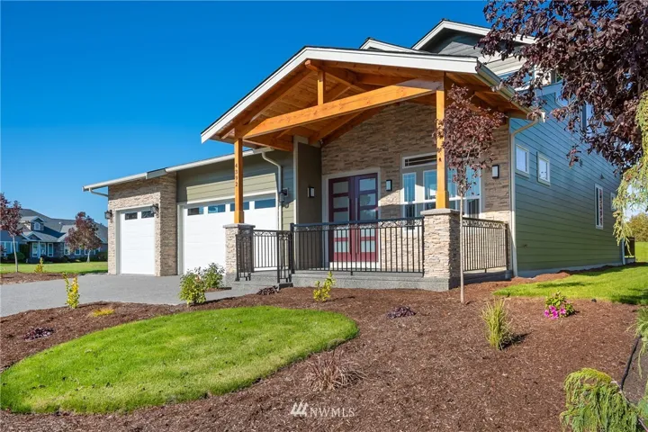 Sunny south facing location, spacious covered front porch.  3 car garage.