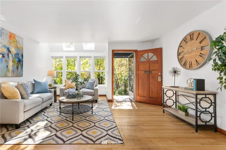 Spacious and light-filled living room welcomes you to this charming townhouse you can call HOME.