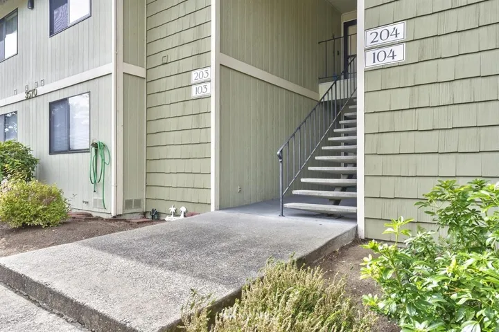 Front entrance. One reserved covered parking. Several guest parking spots.