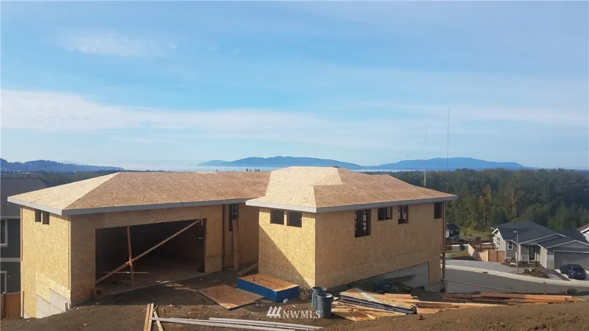 Front yard/entry.  Level driveway and lots of extra parking.