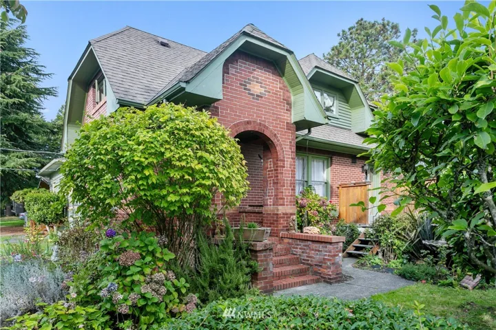 Charming Brick Tudor on a quiet street in Ballard convenient to neighborhood shops, restaurants and market