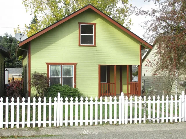 Charming old world craftsman style home in downtown Tenino.  White picket fence and all!