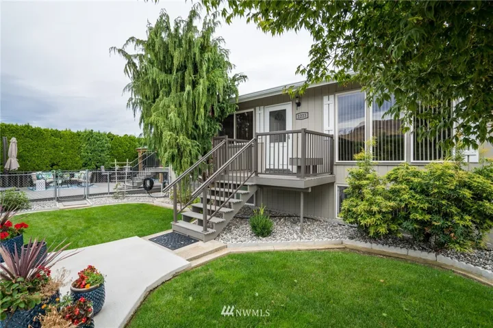 1223 N. Western Ave.  Total, new remodel.  New paint, decking, gazebo, roof, gutters and more!