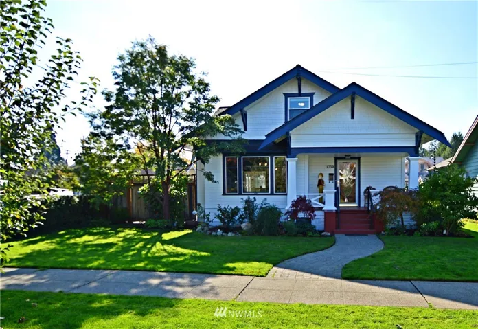 Classic 1920's bungalow complemented by a beautifully landscaped yard.