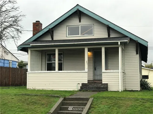 This 1920 Craftsman has so much potential - Double city lot. Roof, vinyl siding and windows are newer ( replaced approx 10 years ago - BUT buyer to verify to their own satisfaction )