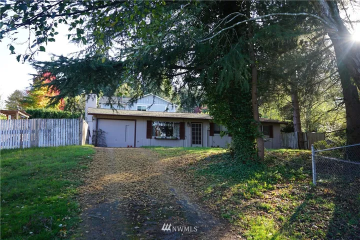 Single level home on a good sized lot.  The garage was converted to living space but it could be reverted.