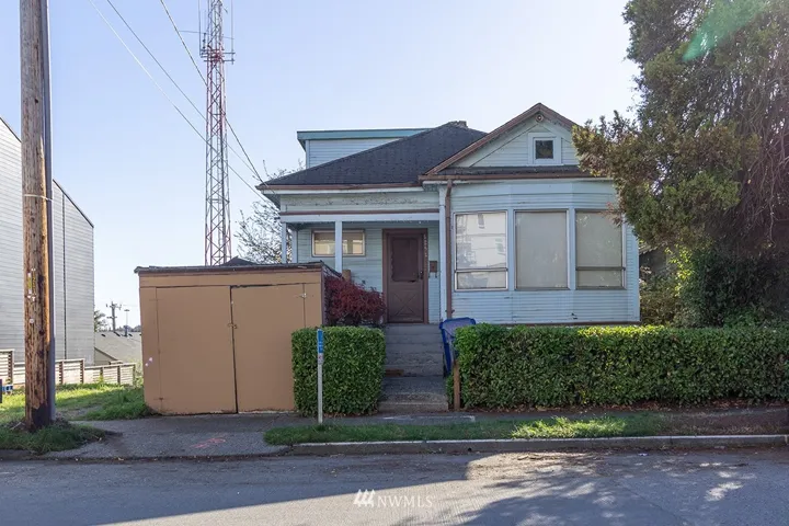 Originally built in 1912, with 3 bed/1 bath single family home features 1,460 sq ft living space and 1,000 sq ft unfinished basement.  Home is livable but in disrepair and maybe considered a tear down.