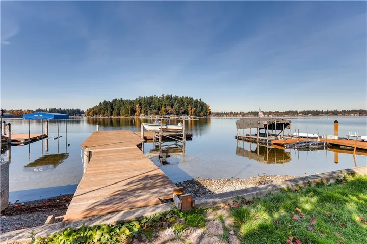 View of Dock From Bulkhead looking out onto American Lake and Silcox Island.