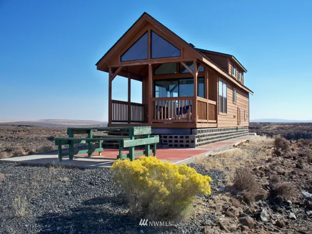 831 Jack Mountain.  Park Model with one bed, one bath.  Covered porch,  paved patio area.