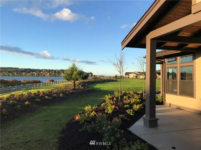 Take in panoramic water views from one of the two patios.