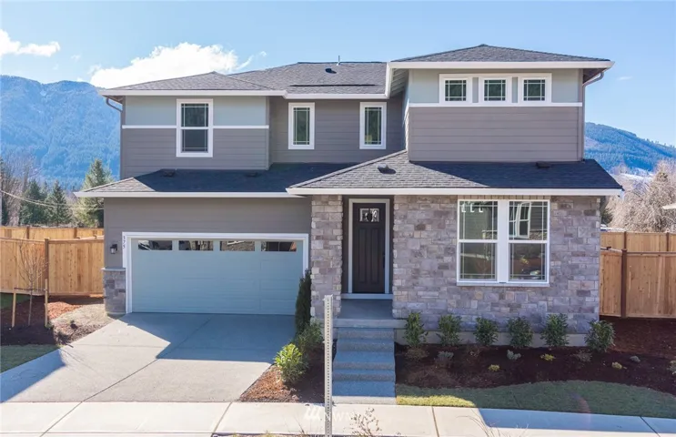 The Roslyn home plan with full yard landscape & fencing, beautiful cultured stone façade and modern craftsman appeal