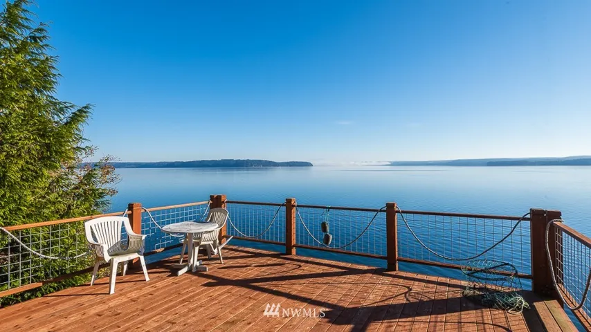 Welcome to 110 Sunny Slope Rd. in Brinnon. Take in the views and bask in the sun on your large private deck above the waters edge. Accessible via stairs from outside of main house.