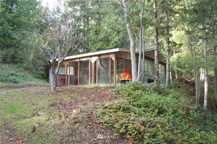 As you reach the top of the knoll, you will see the home.  Nicely sited for your privacy.