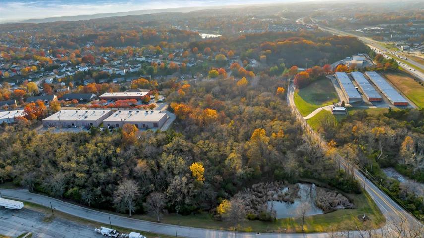 6.94 Vacant Acres Zoned M1. Ruck Rd & Manchester Rd on Right. Looking West toward Hwy 109.