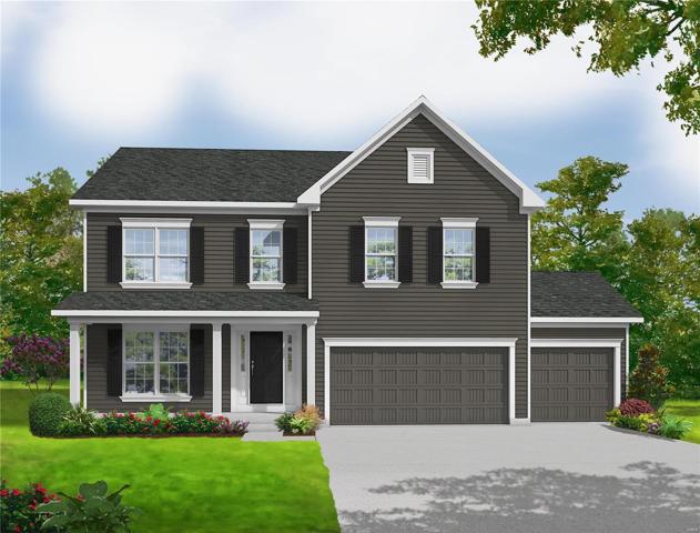 Elevation 1 - base elevation, shown with upgraded garage doors