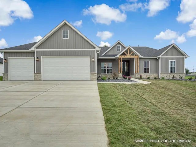 View of front of house with a front lawn and a garage. Sample photos and virtual tour.
