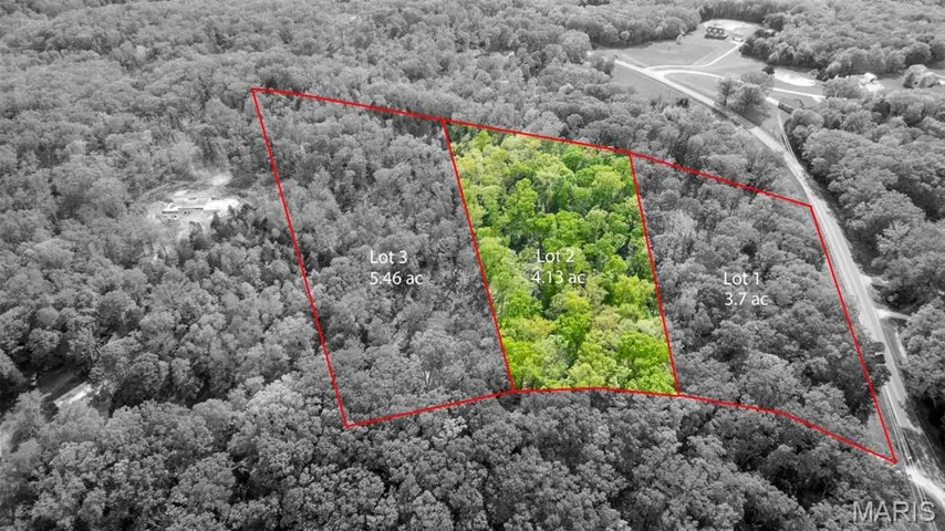 View of property location with property boundaries highlighted and a forest