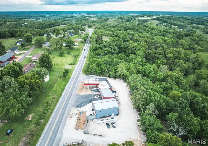 Drone / aerial view of a heavily wooded area