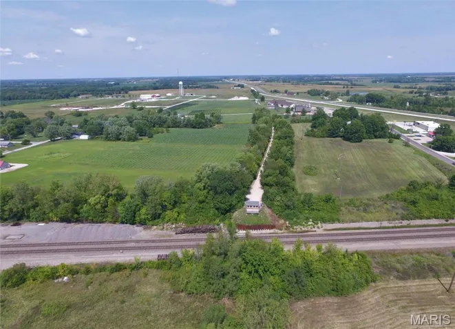 View of rural area featuring large plots for crops