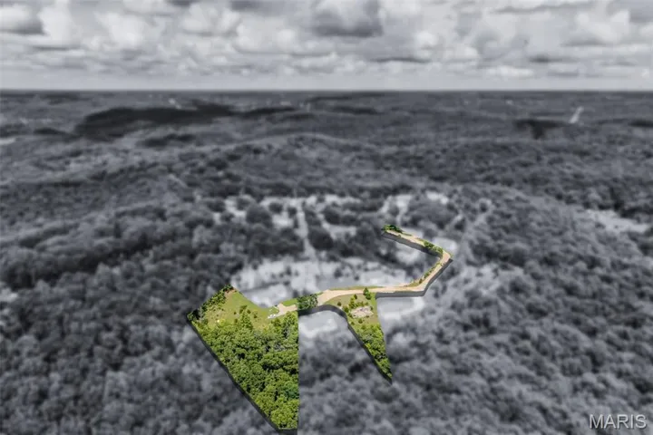 Aerial view of property's location with property parcel outlined