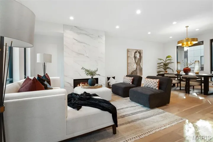 Recessed and designer lighting throughout.