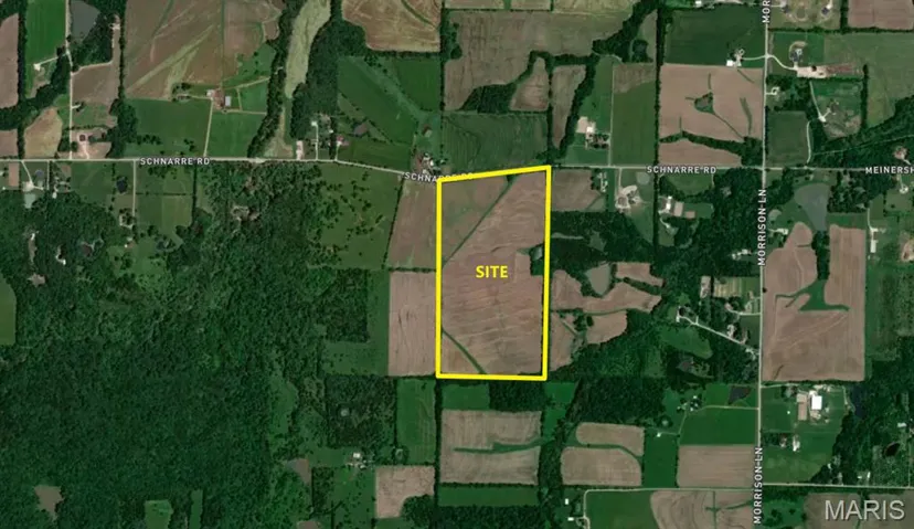 Aerial view of property's location featuring property parcel outlined