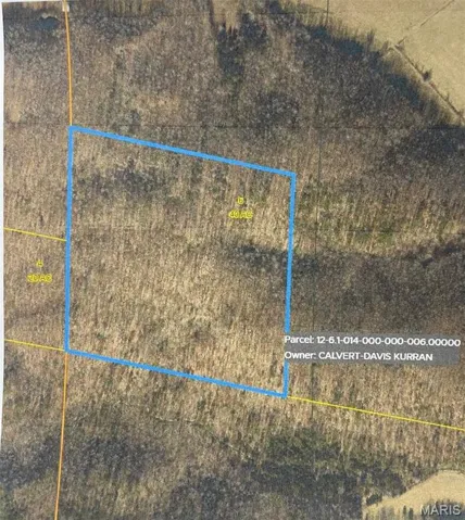 Aerial overview of property's location featuring property parcel outlined