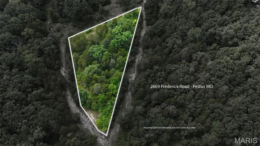 Aerial overview of property's location featuring property boundaries highlighted