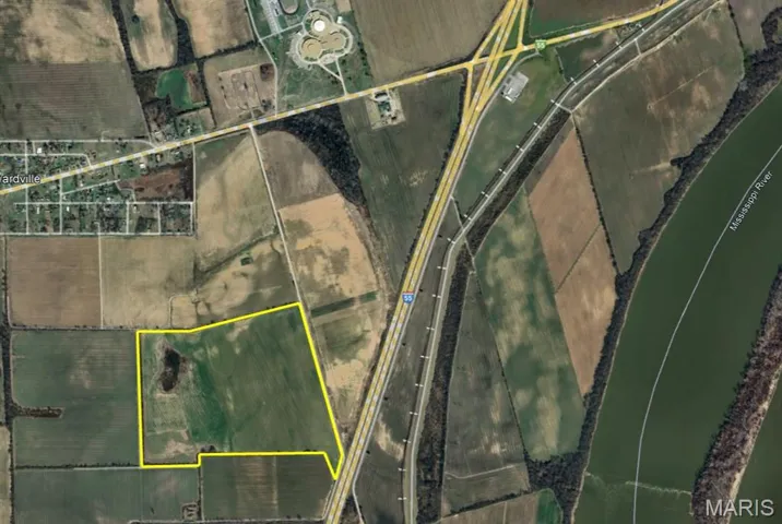 Aerial view of property's location with property parcel outlined