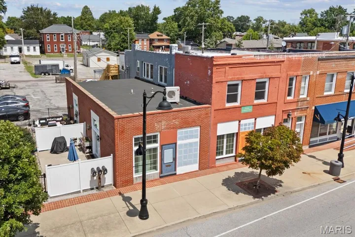 View of property with a residential view