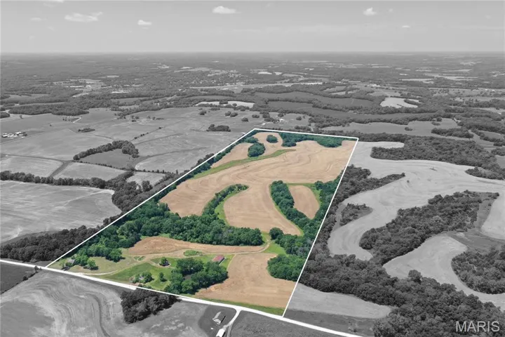 Aerial overview of property's location featuring property boundaries highlighted