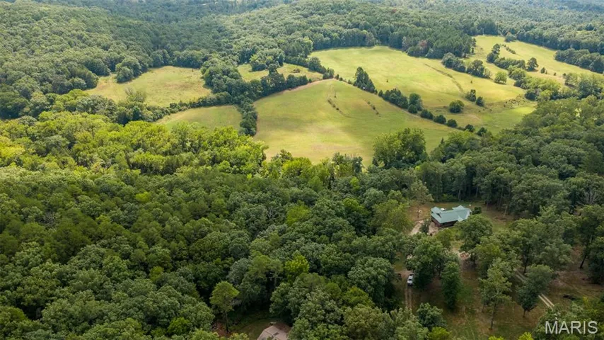 Aerial view of a heavily wooded area