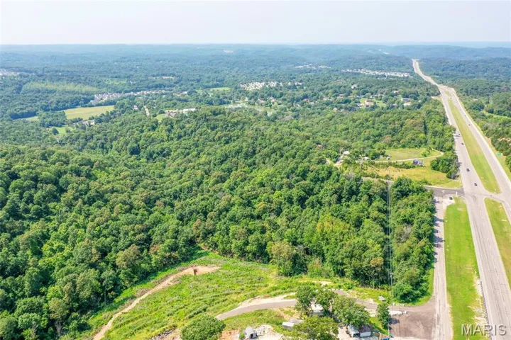 Drone / aerial view of a heavily wooded area