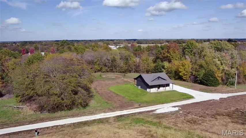 Drone / aerial view of a heavily wooded area