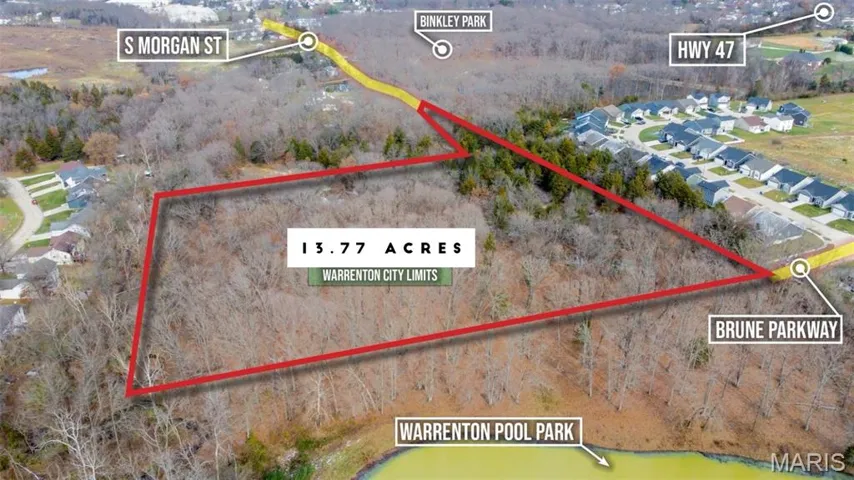 Aerial perspective of suburban area with property parcel outlined