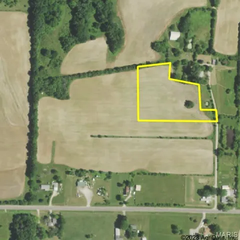 Aerial overview of property's location featuring property boundaries highlighted